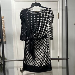 Local designer made. Rutu Bhonsle. Black and white with tie around front.